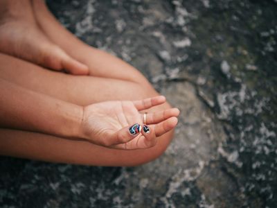 Close-up of hands in a graceful mudra position.